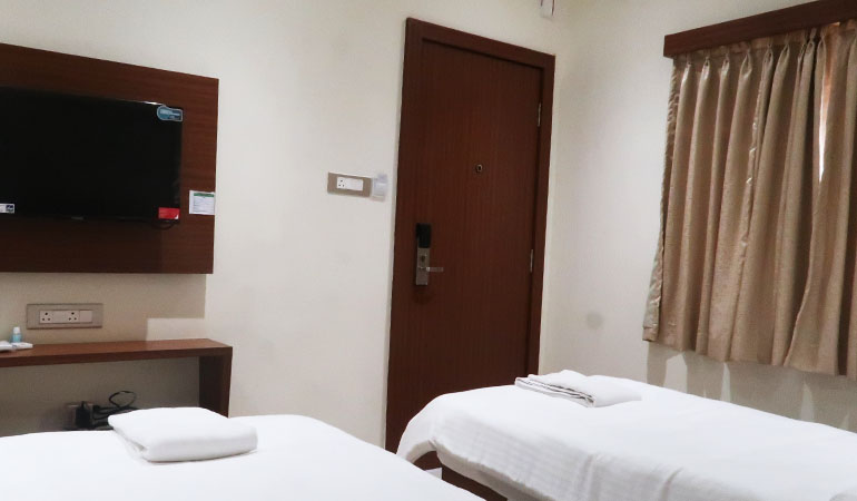 Two Bed Compact Room Tej Grand Chiplun